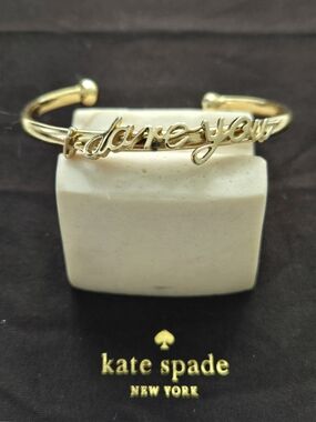 kate spade gold scripted "I Dare you" cuff bracelet